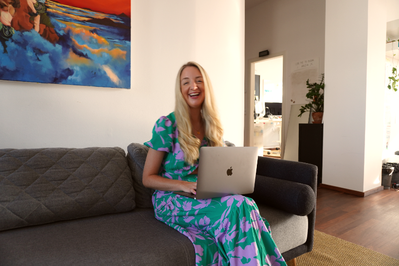 Emily Stevens working on her laptop